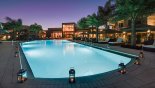 Pool viewed towards clubhouse at dusk