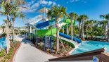Water slide surrounded by a lazy river