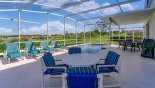 Orlando Villa for rent direct from owner, check out the Extended pool deck with views onto golf course - 4 sun loungers, 2 patio tables, and 12 chairs