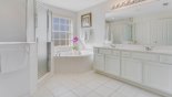 Master #1 ensuite bathroom with corner bath, large walk-in shower, his & hers sinks and separate WC from Monticello 1 Villa for rent in Orlando