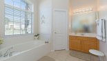Master 1 ensuite bathroom with Jacuzzi bath from Monterey 1 Villa for rent in Orlando