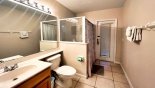 Master ensuite #2 with walk-in shower, single vanity & WC - also serves as pool bathroom from Highlands Reserve rental Villa direct from owner