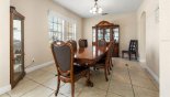Spacious rental Highlands Reserve Villa in Orlando complete with stunning Dining room with large dining table with 6 chairs plus additional 2 chair if needed