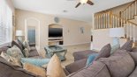 Palm Beach 1 Villa rental near Disney with Family room viewed towards downstairs master #2 bedroom (left of TV)