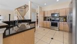 View of kitchen from breakfast nook with this Orlando Villa for rent direct from owner