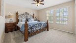 Spacious rental Highlands Reserve Villa in Orlando complete with stunning Bedroom #4 with king sized bed and views onto front gardens
