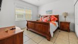 Downstairs bedroom #2 bedroom with king sized sleigh bed from Palm Beach 1 Villa for rent in Orlando