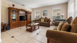 Villa rentals near Disney direct with owner, check out the Front living room with large LCD cable TV