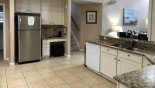 Fully fitted kitchen with quality appliances and granite counter tops from Windsor 1 Villa for rent in Orlando