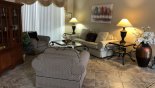 Villa rentals near Disney direct with owner, check out the Living room with a sofa and 2 arm chairs for your relaxation