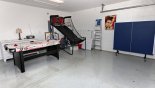 Games room with air hockey table & basketball game - www.iwantavilla.com is your first choice of Villa rentals in Orlando direct with owner