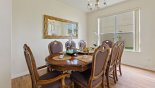 Villa rentals in Orlando, check out the Formal dining area with table & 8 chairs