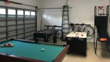 Villa rentals near Disney direct with owner, check out the Games room with pool table air hockey, basketball game, darts & 2 bikes