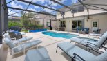 Pool deck with 8 sun loungers - note gas BBQ in left corner from Highlands Reserve rental Villa direct from owner