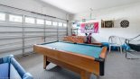 Games room with pool table, air hockey, table foosball, darts & basketball game with this Orlando Villa for rent direct from owner
