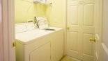 Villa rentals near Disney direct with owner, check out the Laundry room with washer, dryer, iron & ironing board