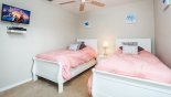 Villa rentals in Orlando, check out the Twin bedroom #4 with wall mounted LCD cable TV