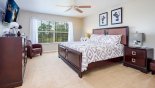 Orlando Villa for rent direct from owner, check out the Master bedroom #1 with views over pool deck & golf course beyond