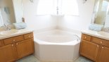 Orlando Villa for rent direct from owner, check out the Master #1 ensuite bathroom with Roman bath, walk-in shower, dual vanities & separate WC