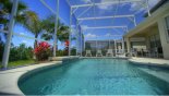 Covered lanai with ample seating for all with this Orlando Villa for rent direct from owner