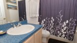 Pool bathroom with bath & shower over from Birchwood + 3 Villa for rent in Orlando
