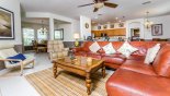 Villa rentals in Orlando, check out the Family room with ample seating to watch a movie on the large flat screen cable TV