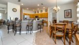 Villa rentals near Disney direct with owner, check out the Kitchen breakfast bar with 4 bar stools & breakfast nook