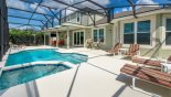 Pool deck with 8 sun loungers & a gas patio heater for cooler nights with this Orlando Villa for rent direct from owner