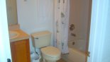 Master 2 ensuite bathroom with bath & shower over, sink & WC with this Orlando Villa for rent direct from owner