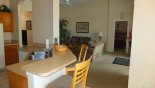 Family room viewed from kitchen / dining area with this Orlando Villa for rent direct from owner