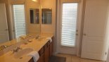 Master 1 ensuite bathroom with private access onto pool deck with this Orlando Villa for rent direct from owner