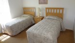 Bedroom 2 with twin sized beds with this Orlando Villa for rent direct from owner