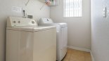 Laundry facilities including washer, dryer, iron & ironing board with this Orlando Villa for rent direct from owner
