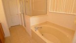 Master 1 ensuite bath & shower - www.iwantavilla.com is your first choice of Villa rentals in Orlando direct with owner
