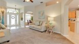 Villa rentals near Disney direct with owner, check out the View of living room towards entrance foyer, dining room & kitchen to right