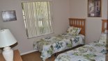 Twin bedroom 3 with views over front gardens from Emerald + 2 Villa for rent in Orlando