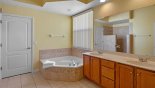 Master #1 ensuite bathroom with large bath, walk-in shower, his & hers sinks & separate WC from Dartmouth 2 Villa for rent in Orlando