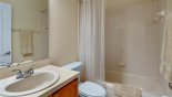 Family bathroom #3 with bath & shower over, single sink and WC from Dartmouth 2 Villa for rent in Orlando