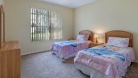 Villa rentals in Orlando, check out the Bedroom #5 with twin beds and views of front gardens