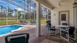 Villa rentals near Disney direct with owner, check out the Covered lanai - perfect for alfresco dining