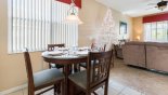 Breakfast nook viewed towards family room with this Orlando Villa for rent direct from owner