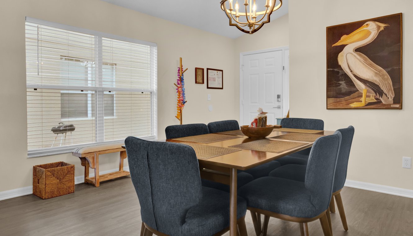 View of Entryway with Coatrack and Bench (and a portrait of Nigel, our pelican mascot)