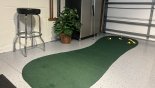 Games Room - Practice Putting Green with this Orlando Villa for rent direct from owner