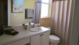 Family bathroom #4 shared between queen room #4 and twin bedroom #5 from Emerald Island Resort rental Villa direct from owner