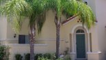 Villa rentals near Disney direct with owner, check out the View of frontage showing walled private courtyard to master bedroom