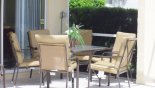 Orlando Villa for rent direct from owner, check out the Covered lanai with patio table with 6 chairs