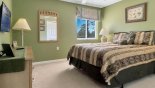 Villa rentals in Orlando, check out the Bedroom #4 with queen sized bed & wall mounted LCD cable TV