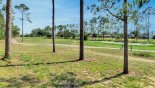 View from outside pool enclosure towards golf course (10th tee) from Canterbury 3 Villa for rent in Orlando