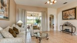 Spacious rental Highlands Reserve Villa in Orlando complete with stunning Living room with direct access & views onto pool deck