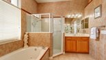 Villa rentals in Orlando, check out the Master ensuite with bath & large walk-in corner shower